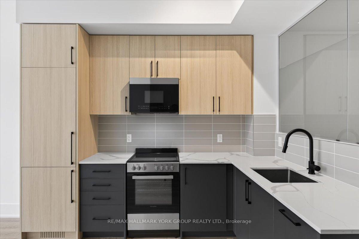 Photo 6 of Unit 112, 2075 King Road, King, King City — HOMEH