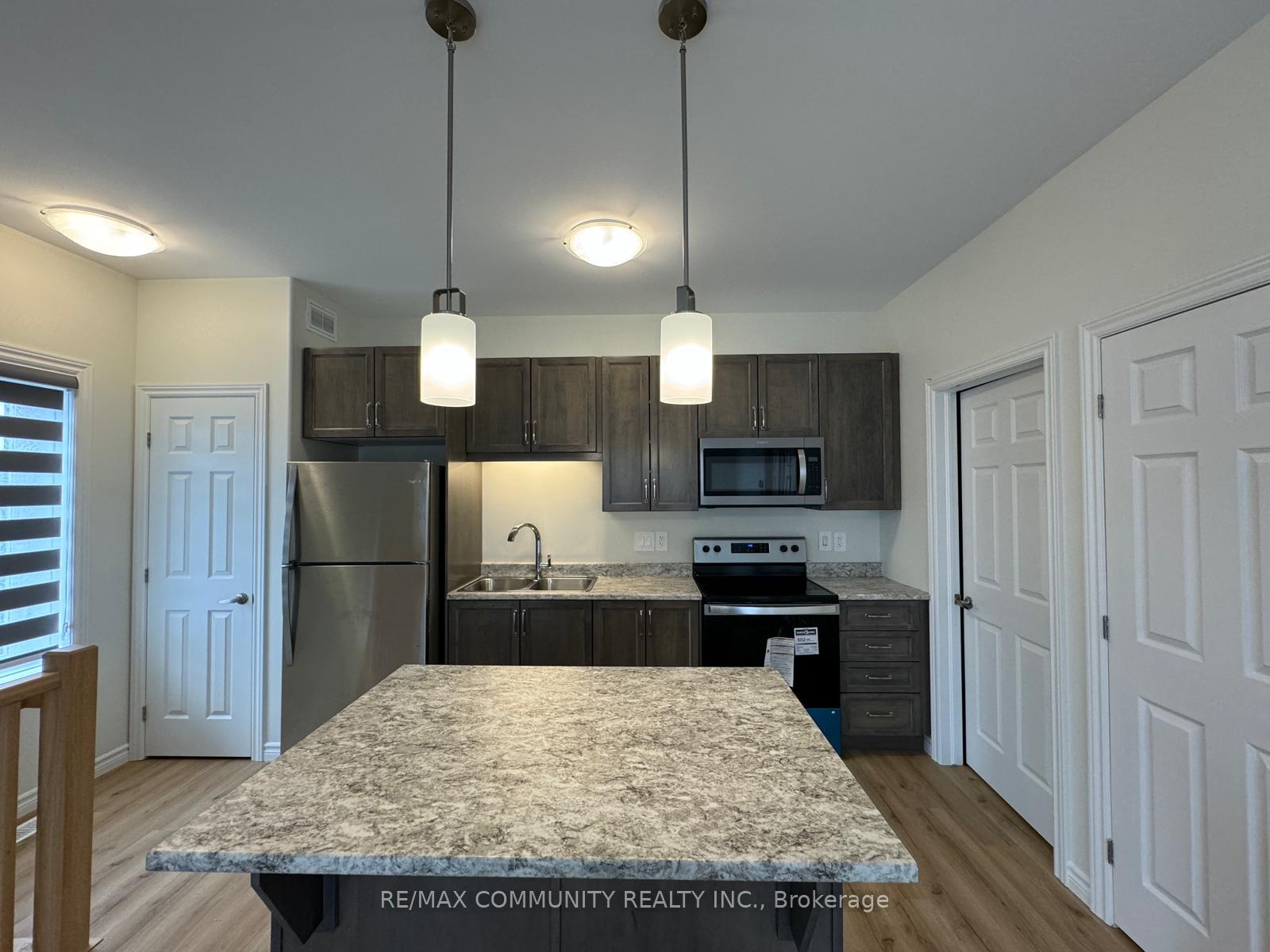 Photo 7 of Unit B, 64 Riverstone Way, Belleville, Thurlow Ward — HOMEH