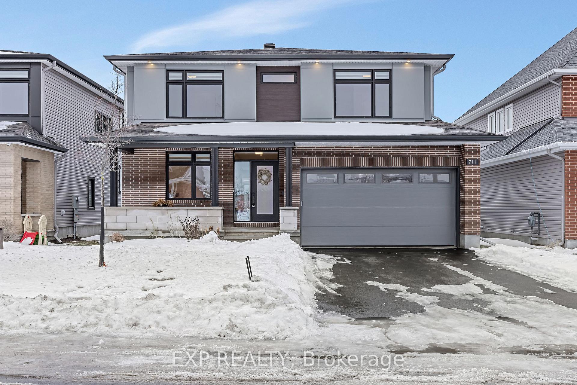 Front of 711 Moonflower Crescent