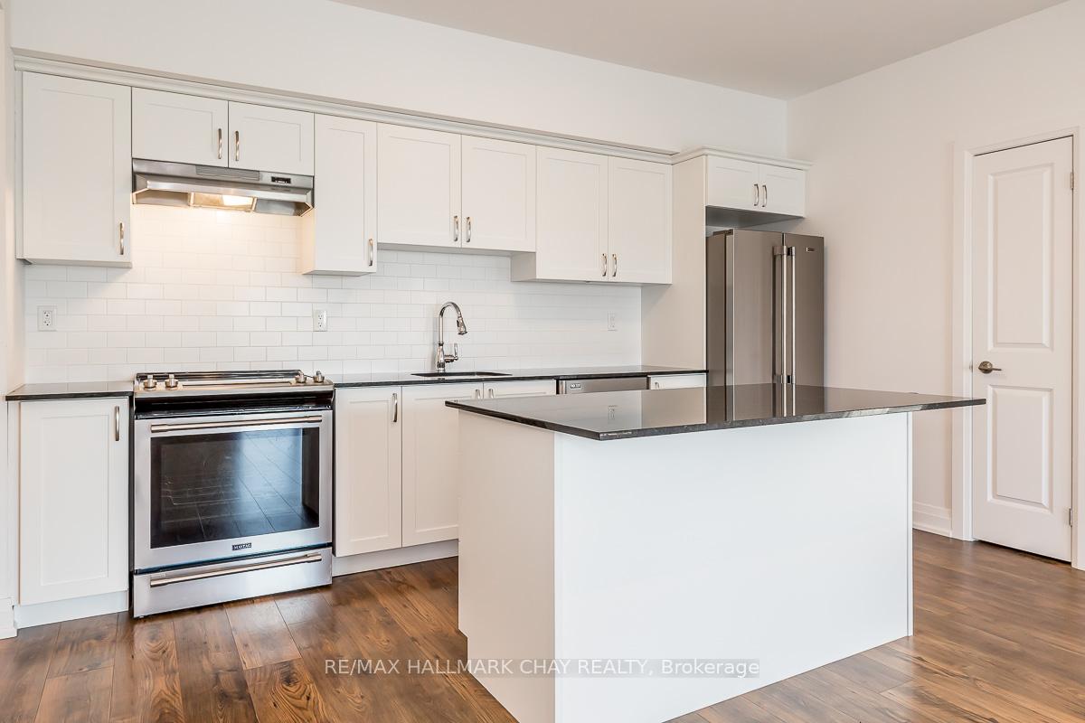 Photo 9 of Unit 402, 299 Cundles Road E, Barrie, Alliance — HOMEH