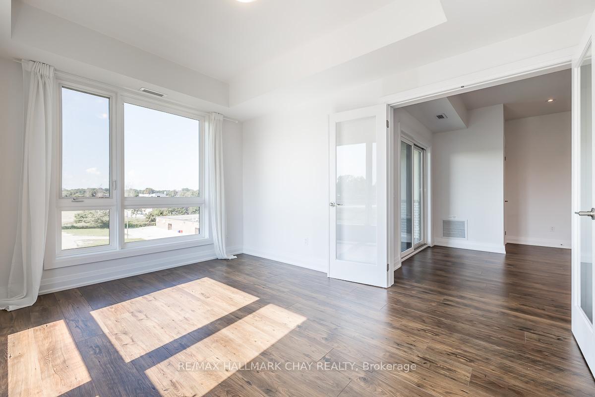Photo 16 of Unit 402, 299 Cundles Road E, Barrie, Alliance — HOMEH