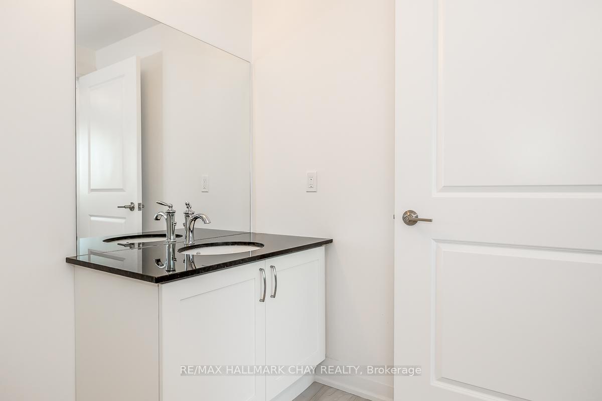 Photo 19 of Unit 402, 299 Cundles Road E, Barrie, Alliance — HOMEH