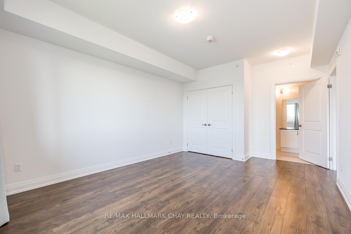 Photo 56 of Unit 402, 299 Cundles Road E, Barrie, Alliance — HOMEH