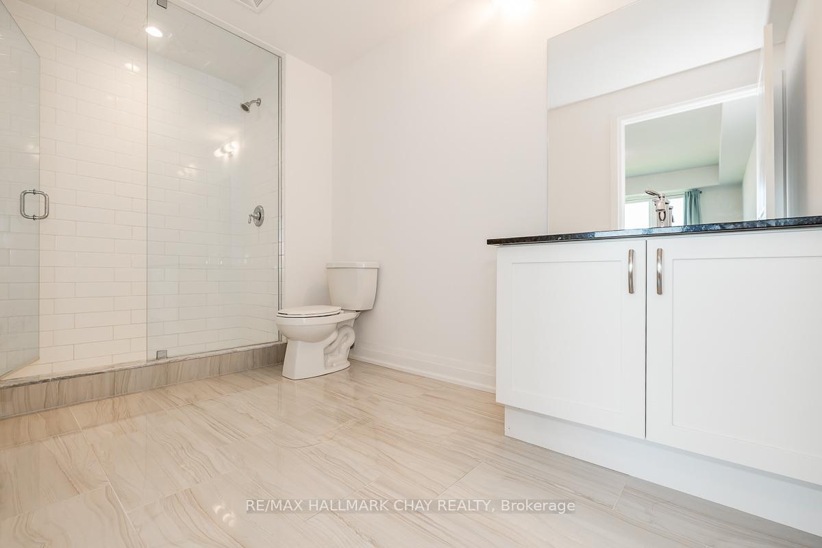 Photo 58 of Unit 402, 299 Cundles Road E, Barrie, Alliance — HOMEH