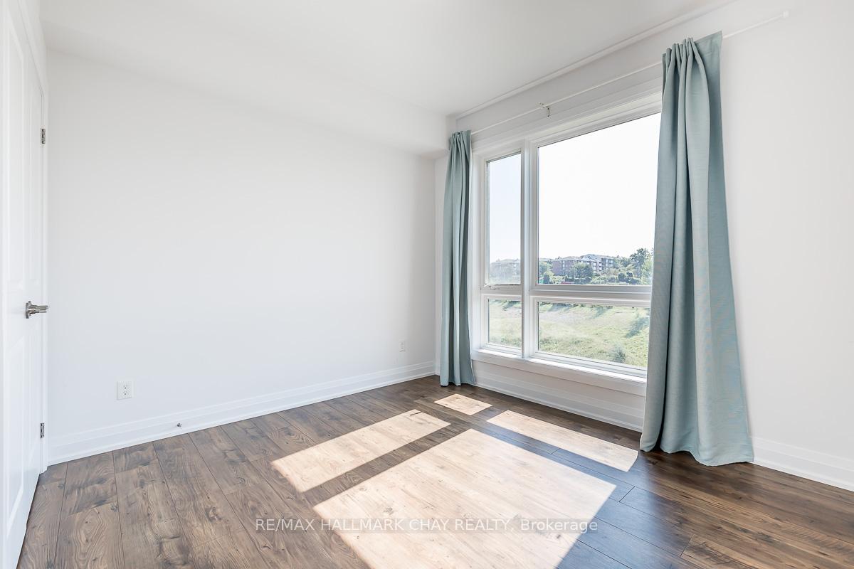 Photo 59 of Unit 402, 299 Cundles Road E, Barrie, Alliance — HOMEH