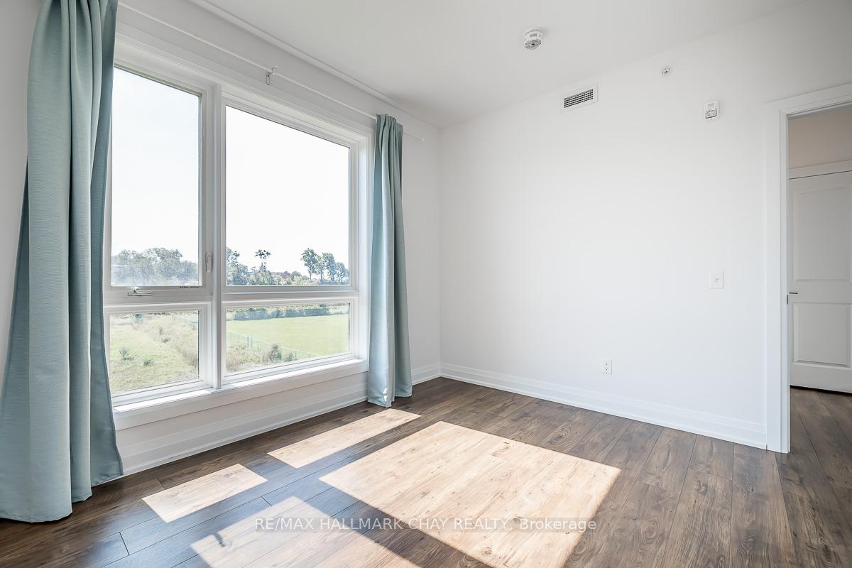 Photo 61 of Unit 402, 299 Cundles Road E, Barrie, Alliance — HOMEH