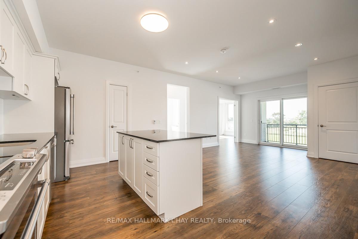Photo 26 of Unit 402, 299 Cundles Road E, Barrie, Alliance — HOMEH