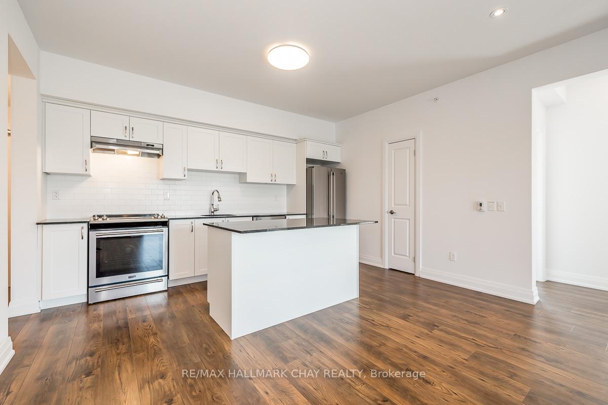 Photo 27 of Unit 402, 299 Cundles Road E, Barrie, Alliance — HOMEH