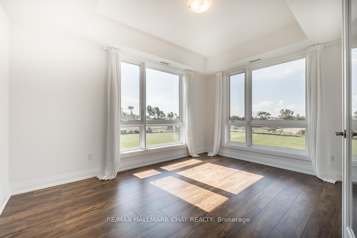 Photo 34 of Unit 402, 299 Cundles Road E, Barrie, Alliance — HOMEH