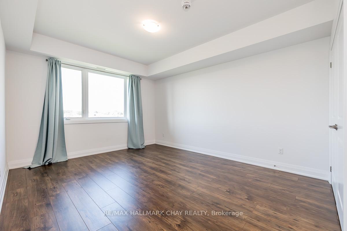 Photo 41 of Unit 402, 299 Cundles Road E, Barrie, Alliance — HOMEH