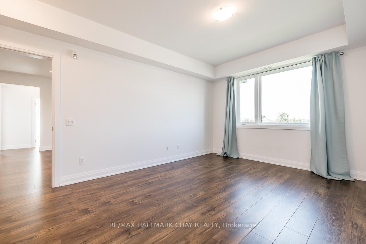 Photo 44 of Unit 402, 299 Cundles Road E, Barrie, Alliance — HOMEH