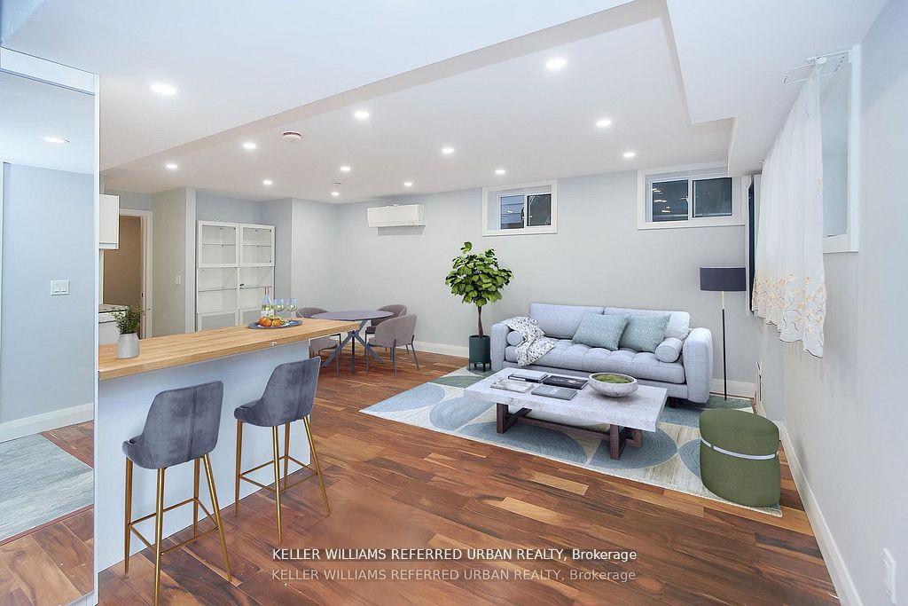 Photo 3 of Unit Lower, 253 Cedarvale Avenue, Toronto, Woodbine-Lumsden — HOMEH