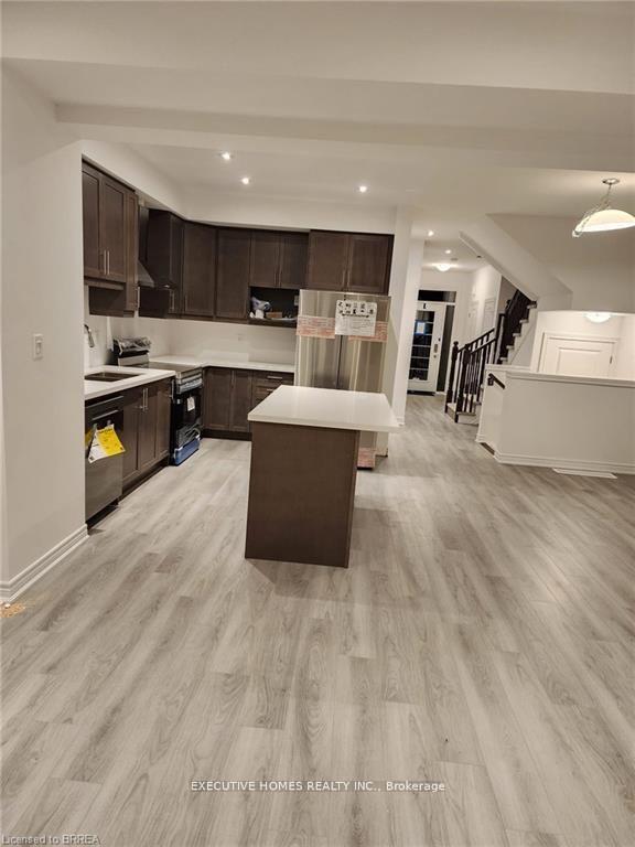 Photo 3 of Unit 100, 120 Court Drive, Brant, Paris — HOMEH