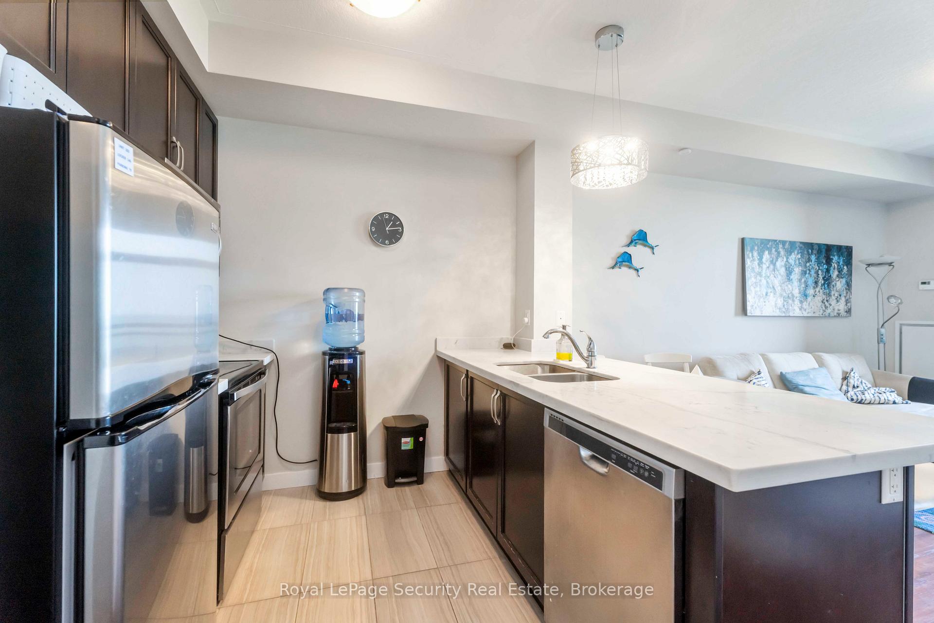 Photo 3 of Unit 203, 35 Southshore Crescent, Hamilton, Stoney Creek — HOMEH