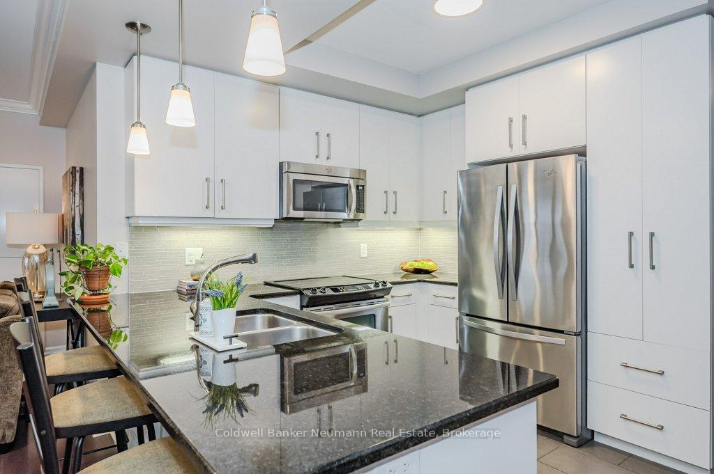 Photo 2 of Unit 806, 160 Macdonell Street, Guelph, Downtown — HOMEH