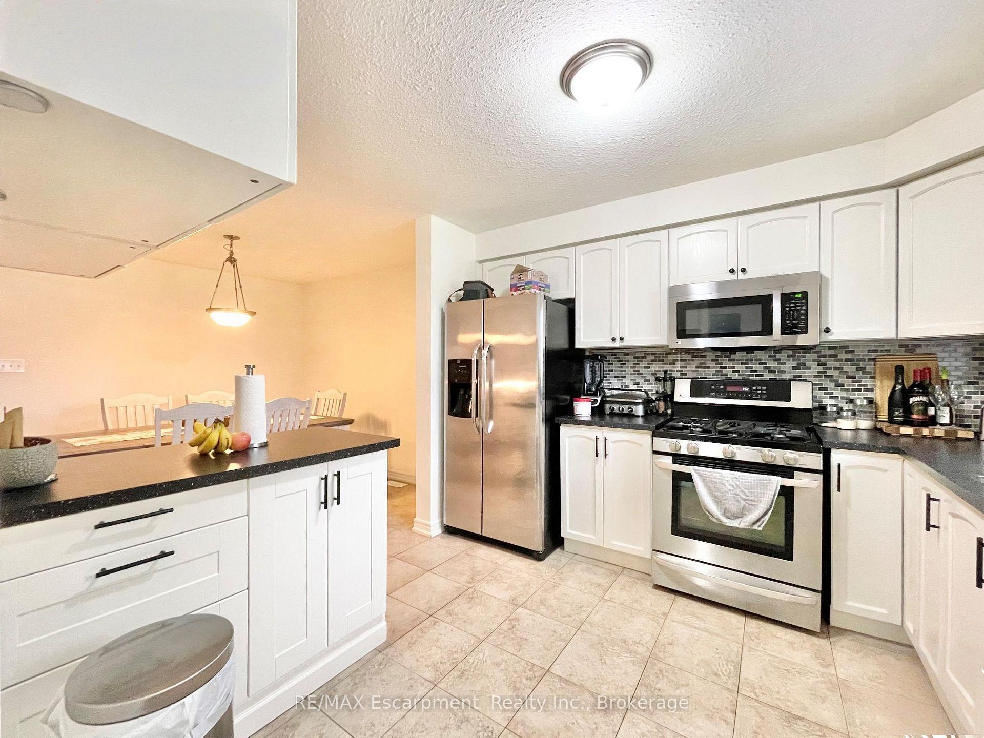 Photo 2 of Unit 6, 78 Peachwood Crescent, Hamilton, Stoney Creek — HOMEH