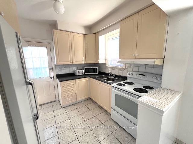 Photo 2 of 405 Northcliffe Boulevard, Toronto, Oakwood Village — HOMEH