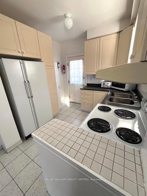 Photo 13 of 405 Northcliffe Boulevard, Toronto, Oakwood Village — HOMEH