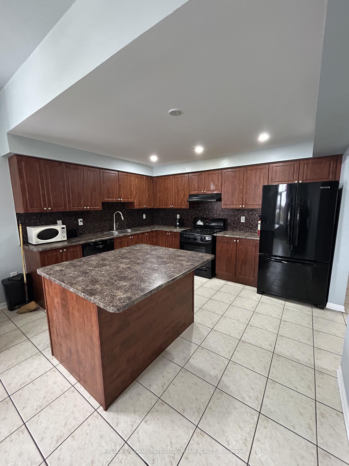 Photo 3 of Unit 1, 52 Commuter Drive, Brampton, Fletcher's Meadow — HOMEH