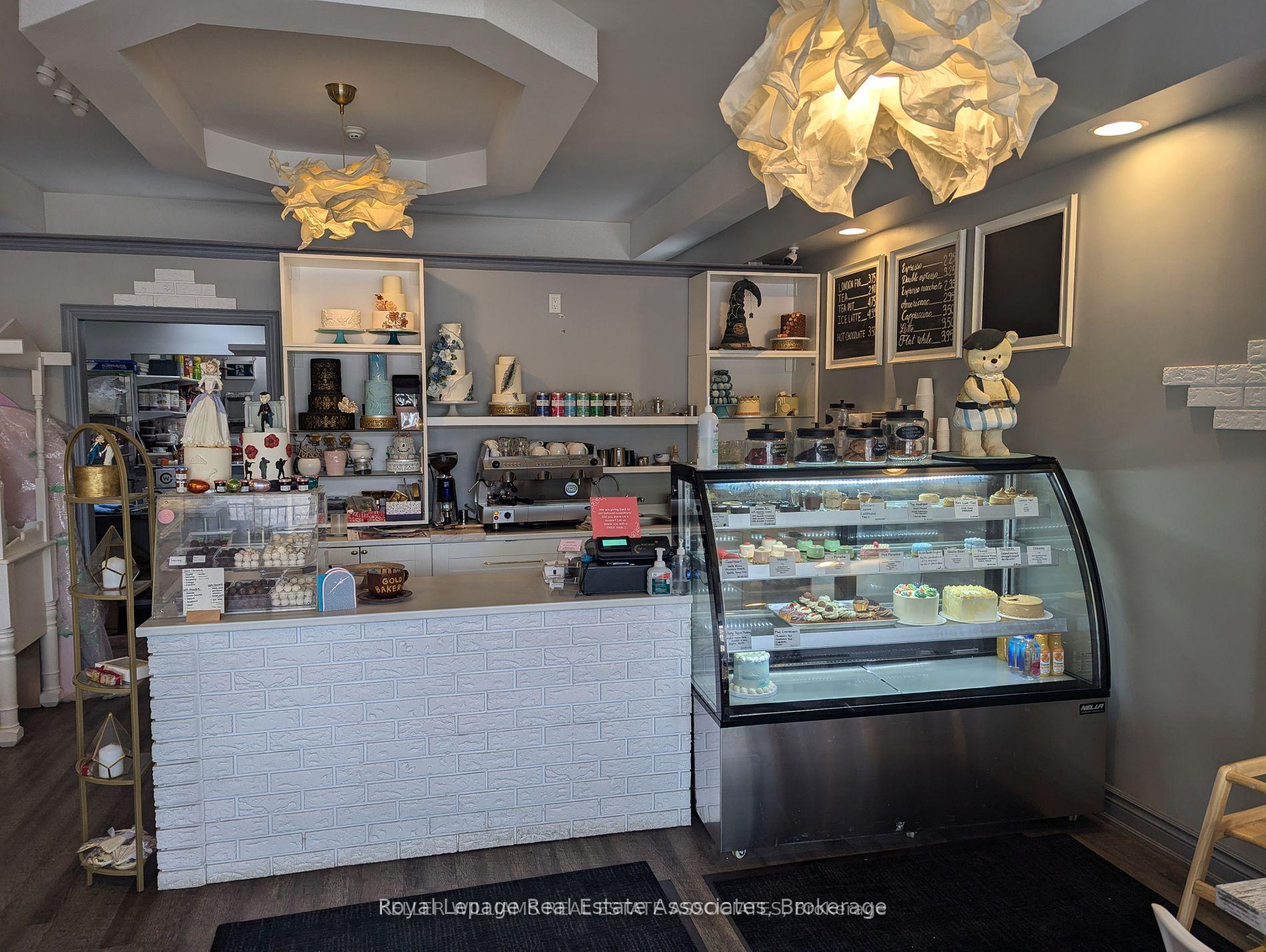 Photo 6 of 233 Lakeshore Road E, Mississauga, Port Credit — HOMEH