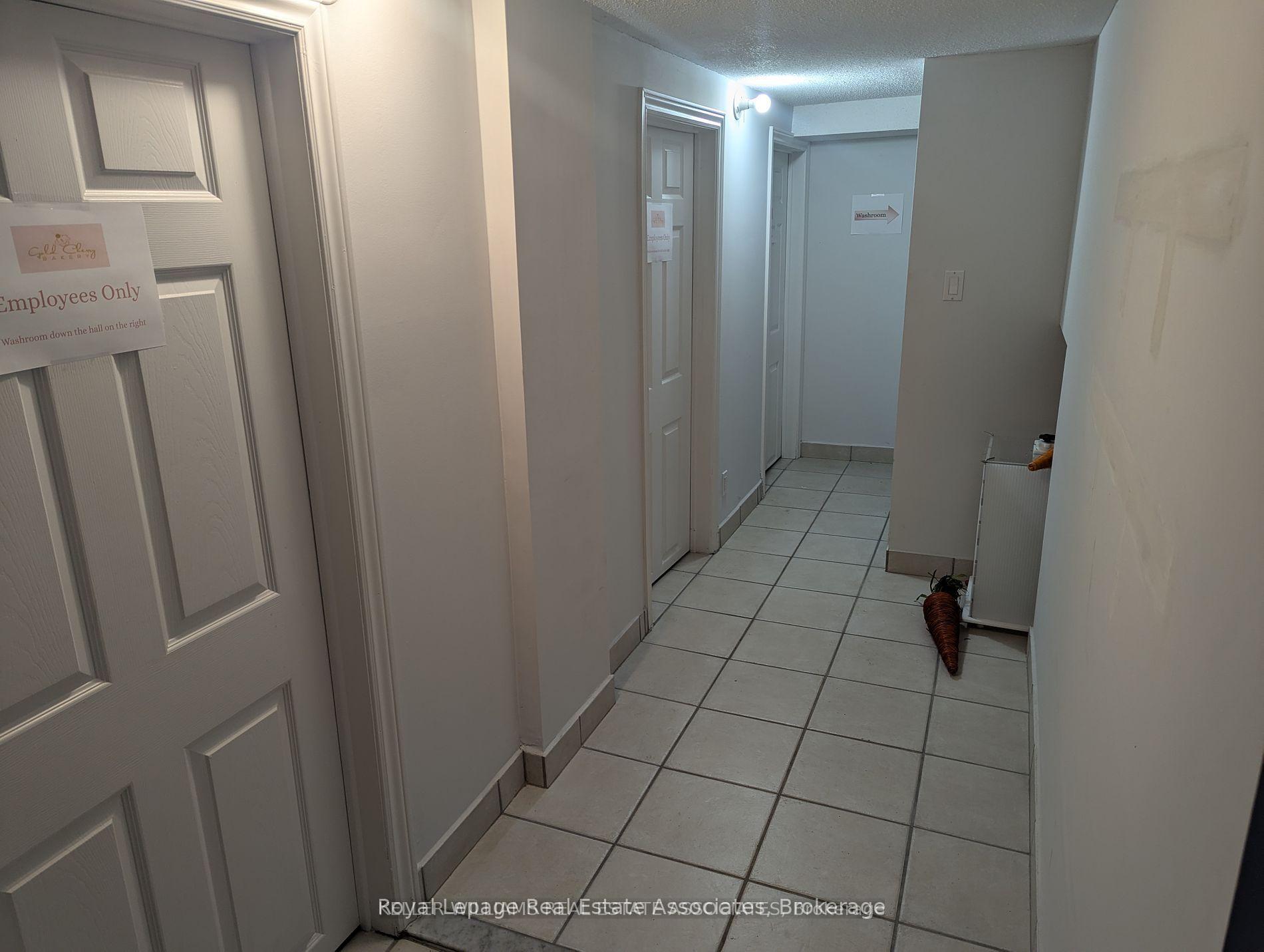 Photo 4 of 233 Lakeshore Road E, Mississauga, Port Credit — HOMEH