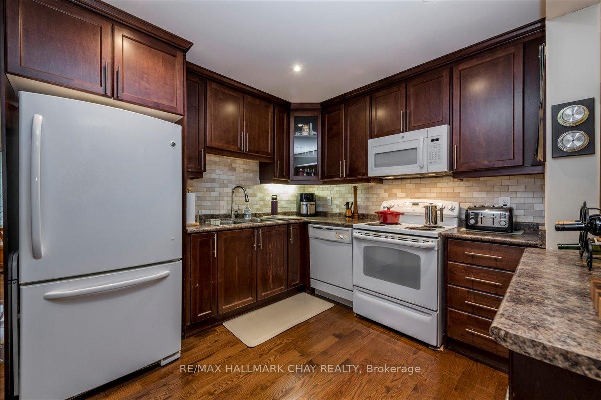 Photo 11 of Unit 7, 90 Sovereigns Gate, Barrie, Innis-Shore — HOMEH