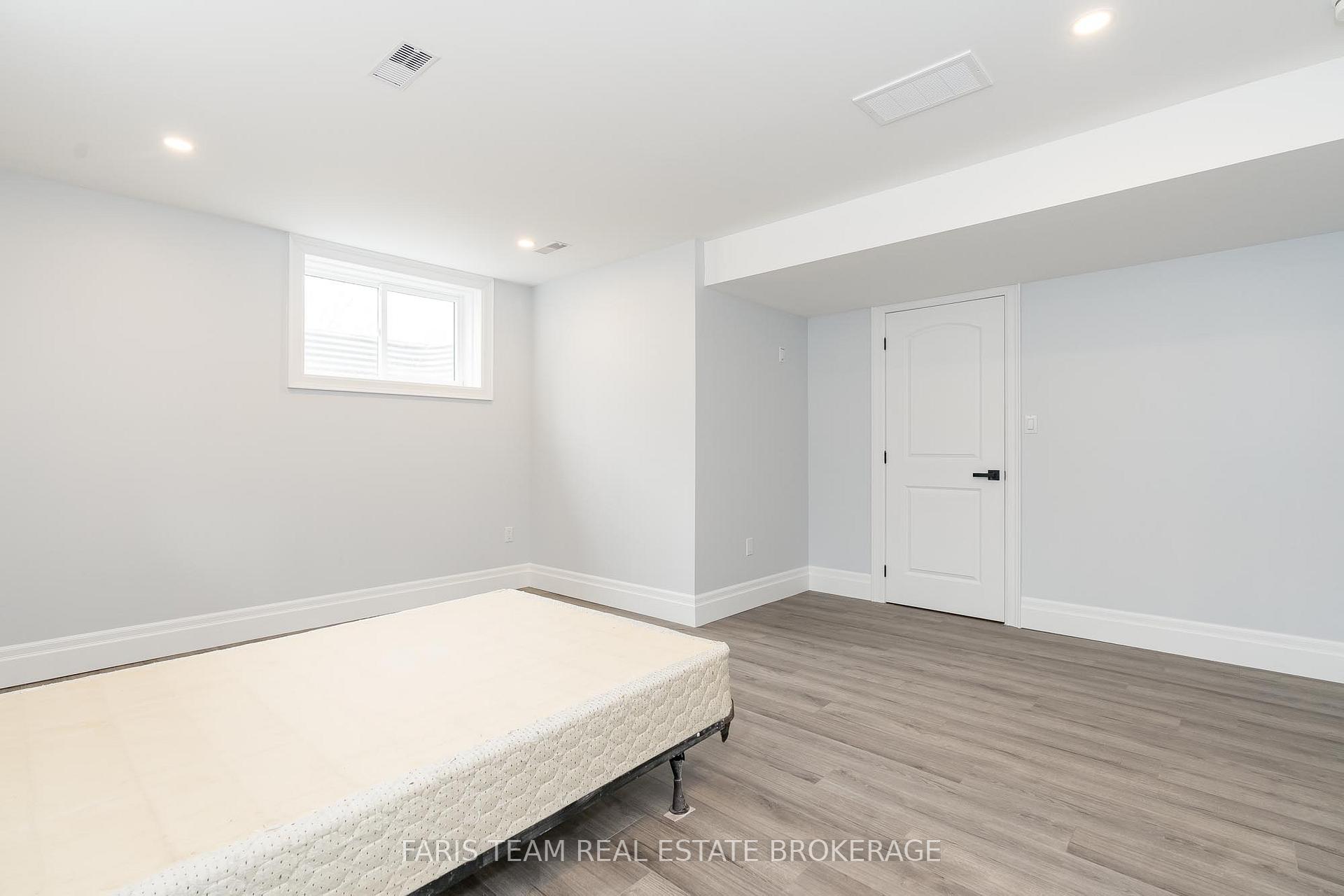 Photo 15 of 1532 Champlain Road, Tiny, Rural Tiny — HOMEH