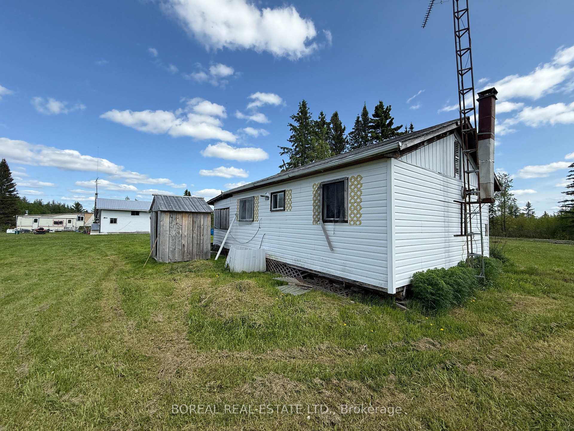Photo 36 of 295-299 Bentley Lake Road, Cochrane — HOMEH