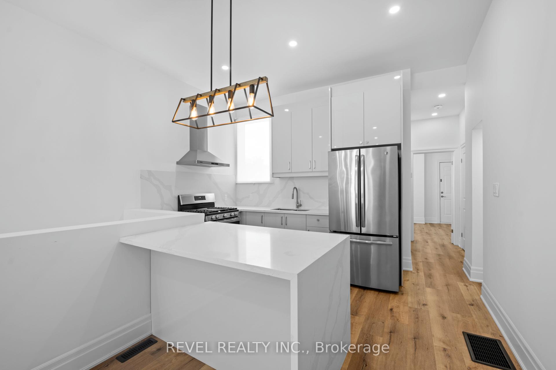 Photo 8 of Unit #A, 153 Bay Street, Hamilton, Central — HOMEH