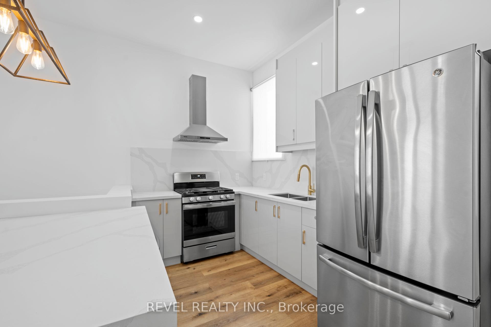 Photo 3 of Unit #A, 153 Bay Street, Hamilton, Central — HOMEH