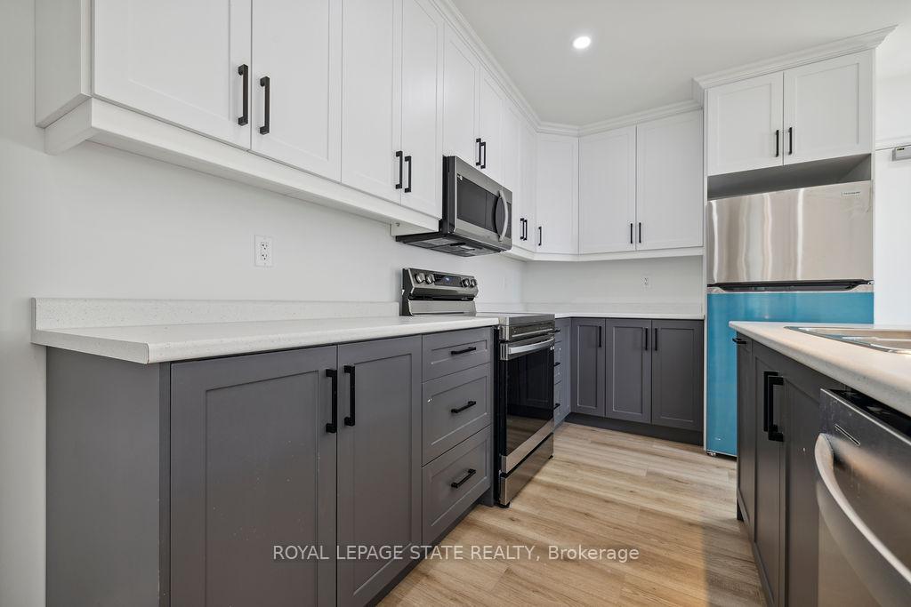 Photo 2 of Unit 1, 132 Prospect Street S, Hamilton, Gibson — HOMEH