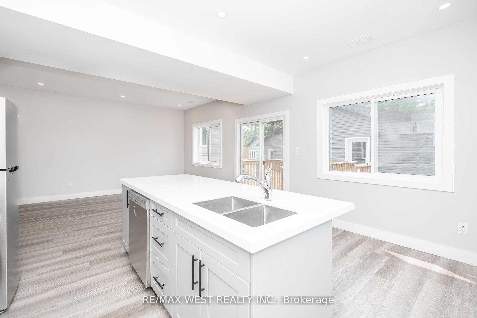 Photo 5 of Unit 1, 172 Cundles Road W, Barrie, Sunnidale — HOMEH