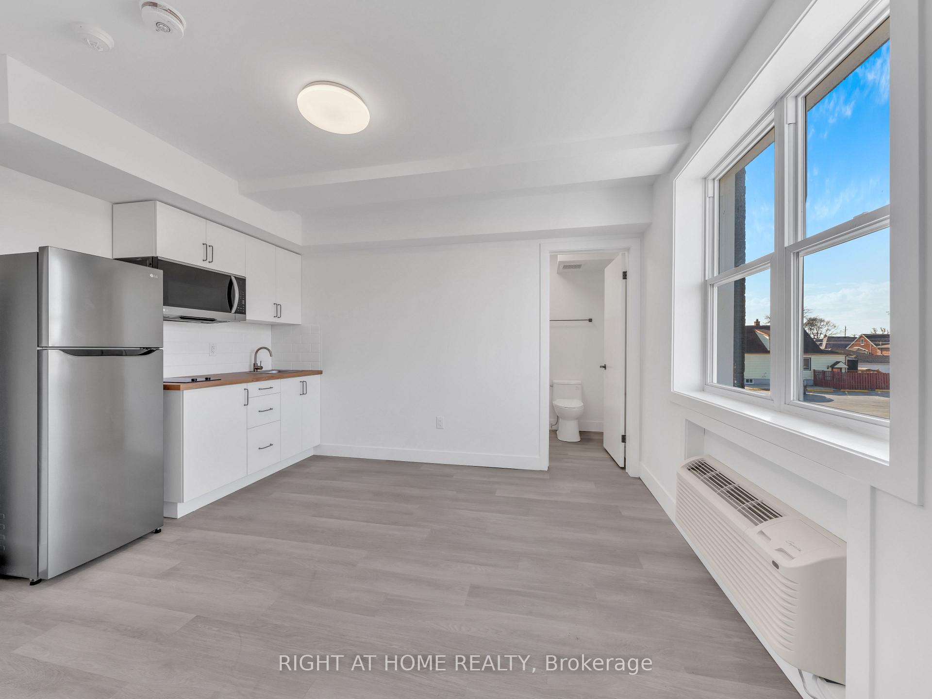 Photo 3 of Unit 201, 1804 Drouillard Road, Windsor — HOMEH