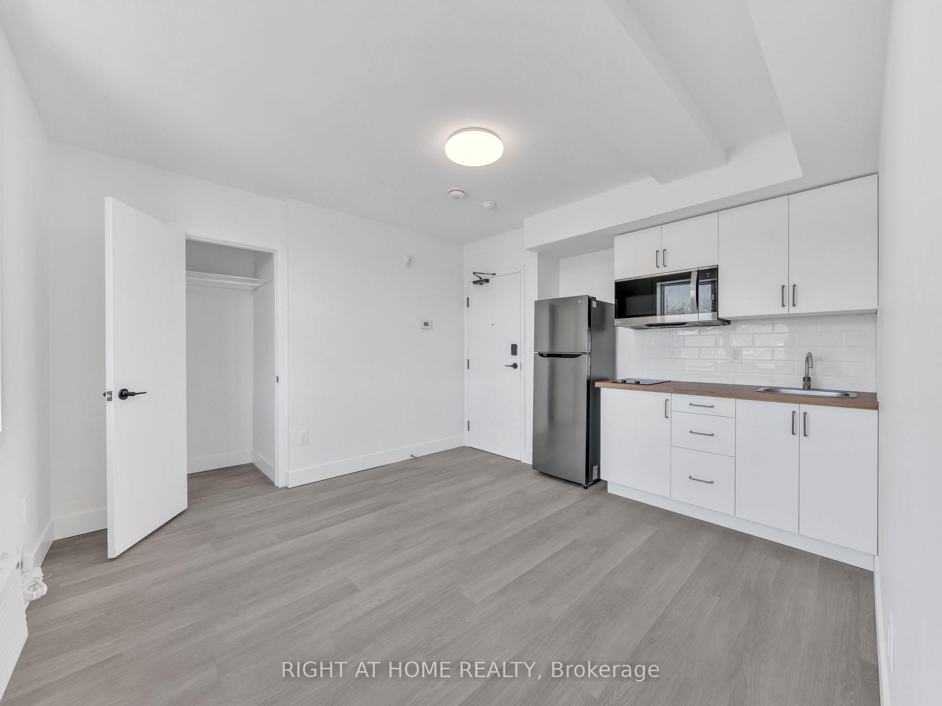 Photo 2 of Unit 201, 1804 Drouillard Road, Windsor — HOMEH
