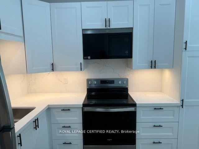 Photo 3 of Unit 5, 3 Denison Avenue, Brampton, Downtown Brampton — HOMEH
