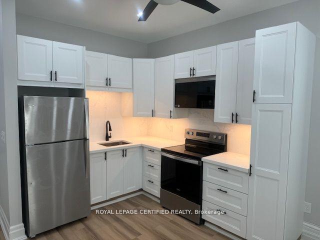 Photo 7 of Unit 5, 3 Denison Avenue, Brampton, Downtown Brampton — HOMEH