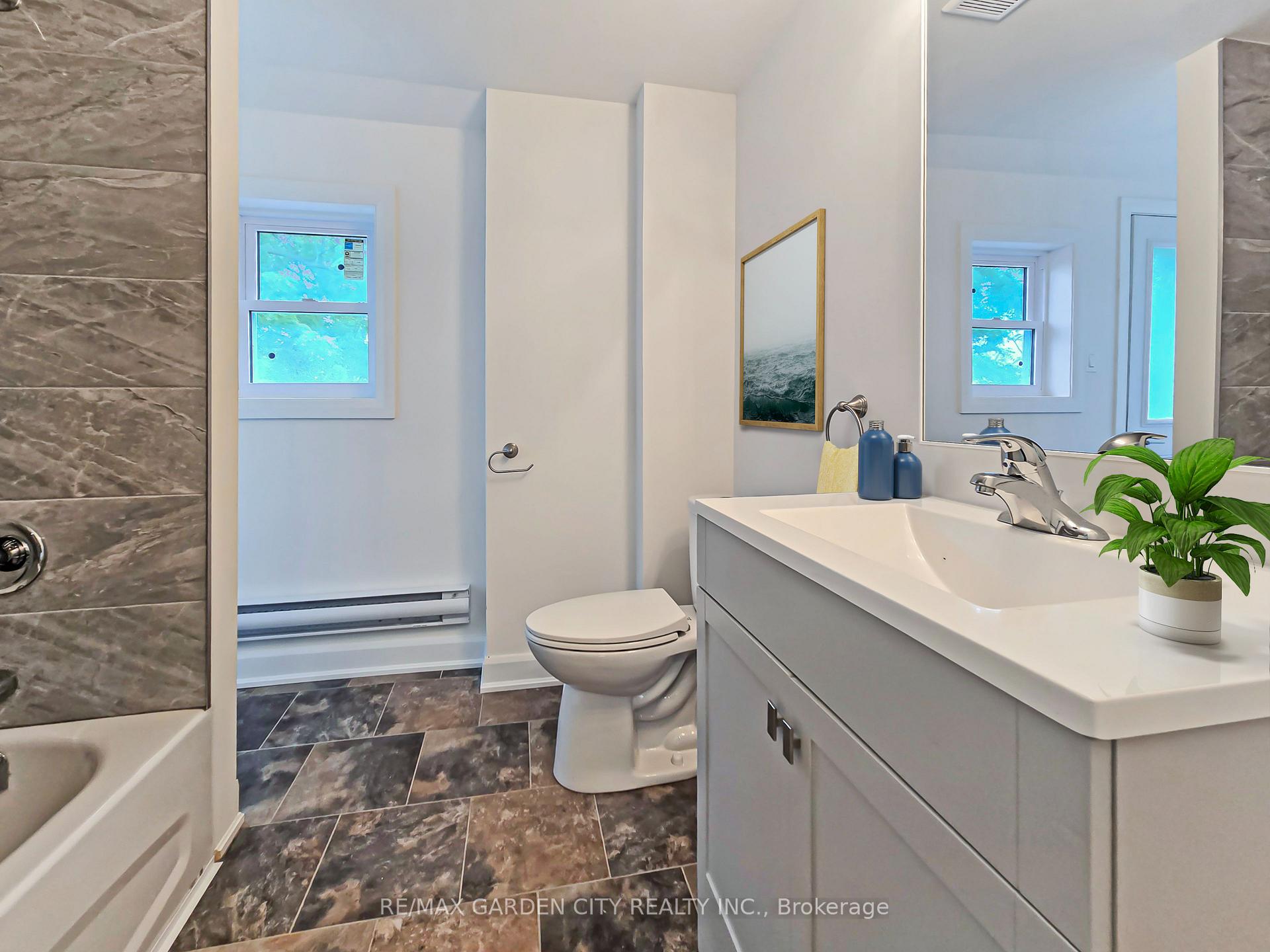Photo 3 of Unit 4, 63 Main Street E, Grimsby, Grimsby East — HOMEH