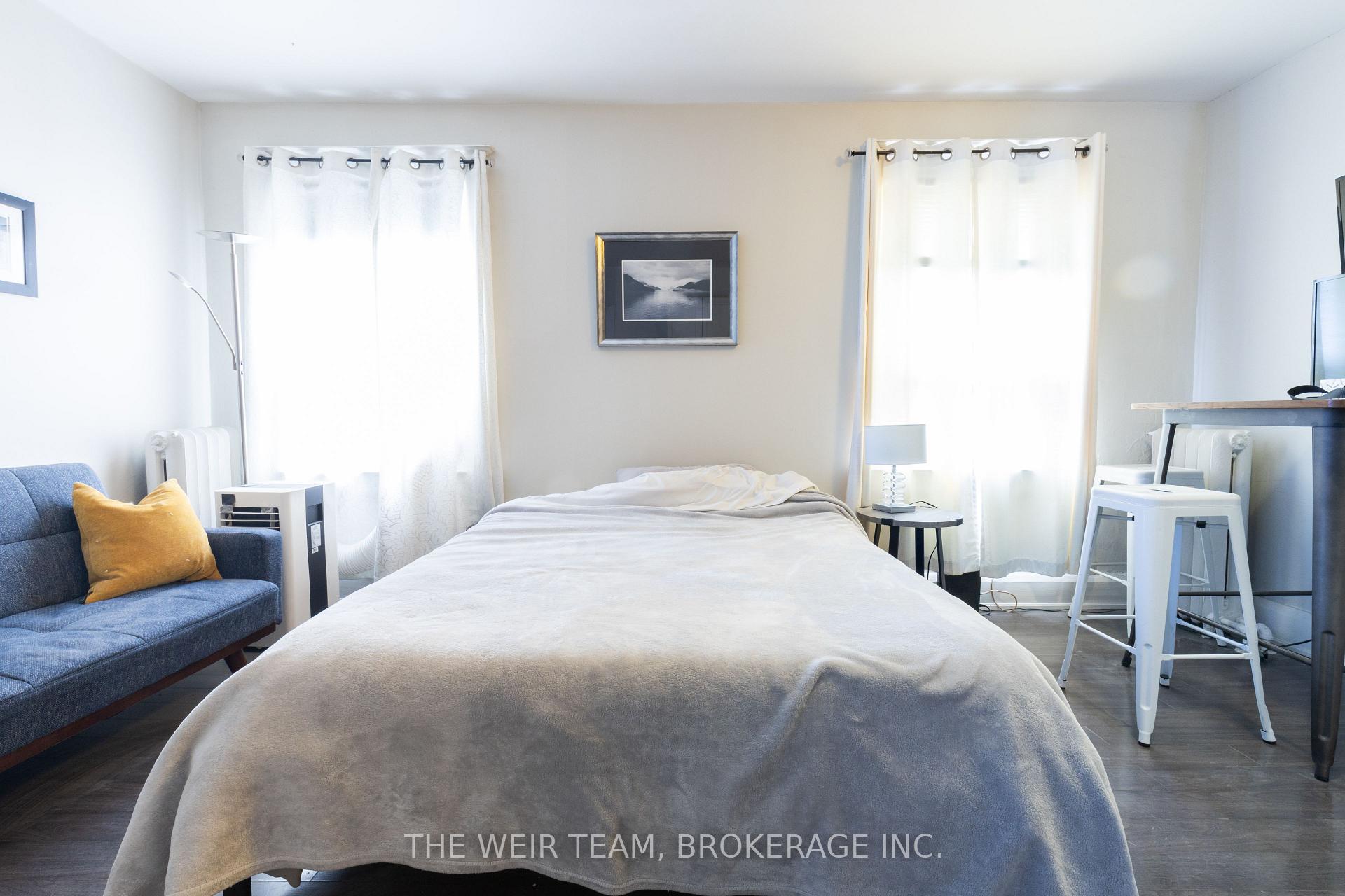 Photo 2 of 2040 Danforth Avenue, Toronto, Woodbine-Lumsden — HOMEH