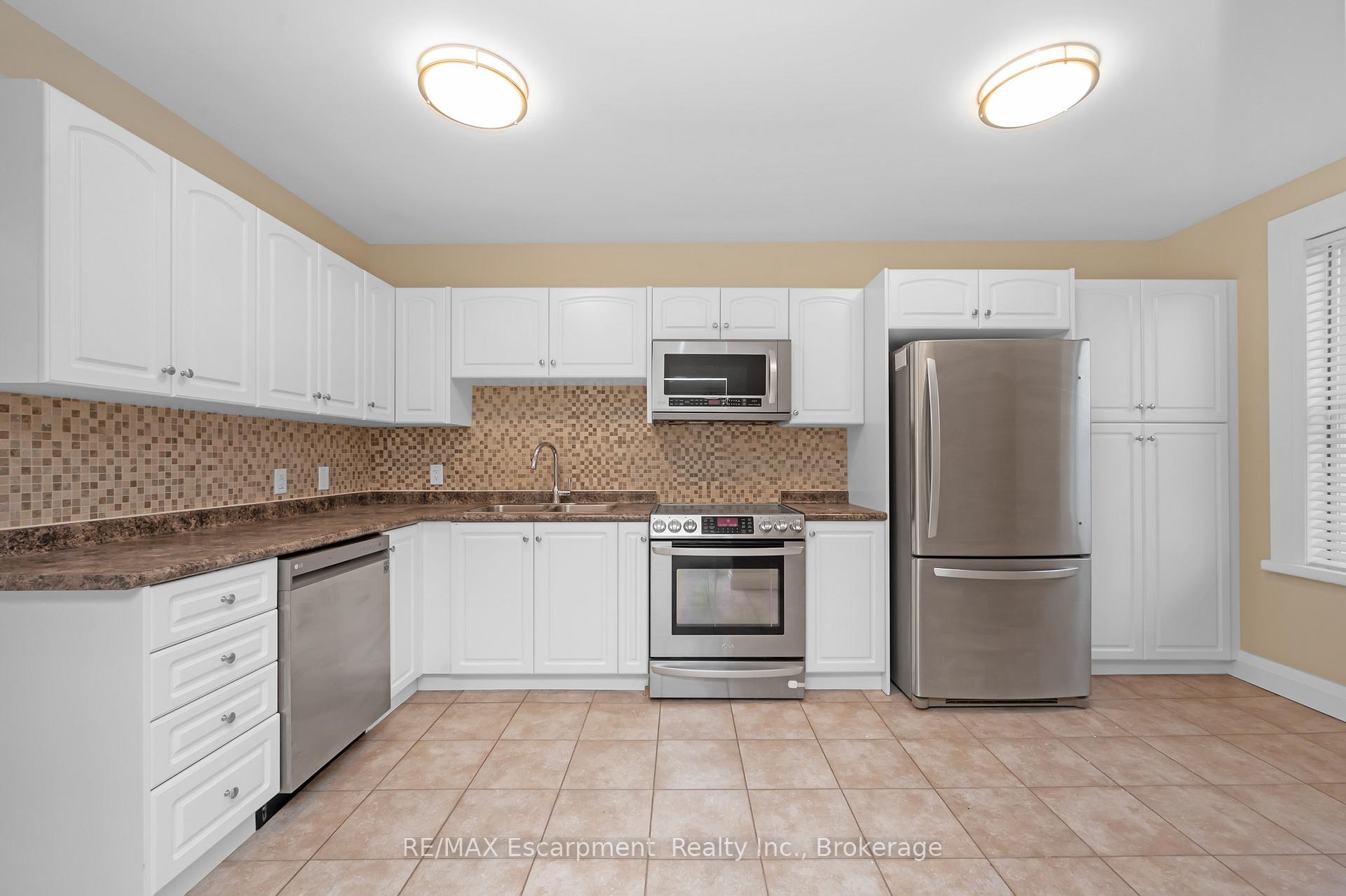 Photo 10 of Unit Upper, 31 Main Street S, Hamilton, Waterdown — HOMEH