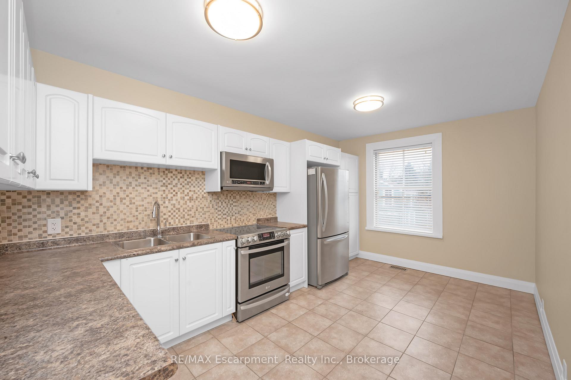 Photo 14 of Unit Upper, 31 Main Street S, Hamilton, Waterdown — HOMEH