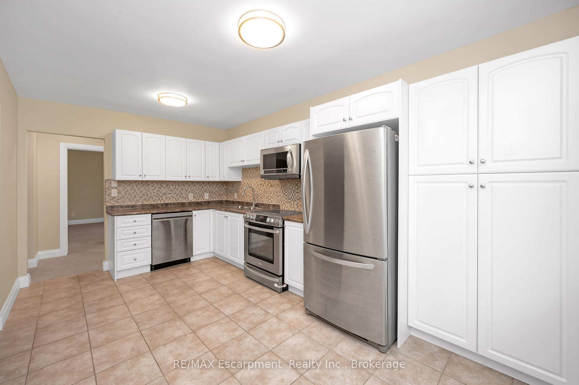 Photo 16 of Unit Upper, 31 Main Street S, Hamilton, Waterdown — HOMEH