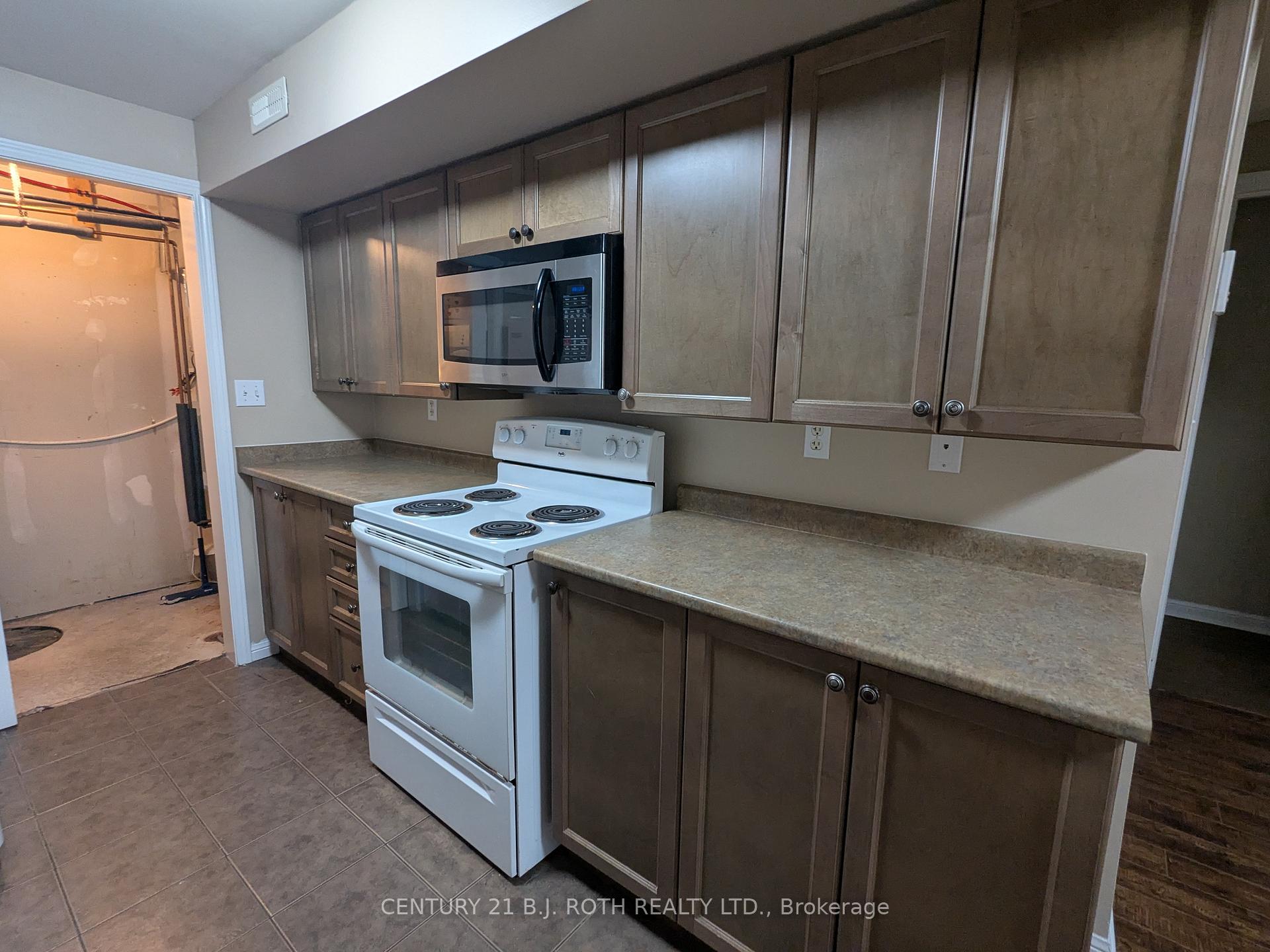 Photo 10 of Unit 13, 175 Stanley Street, Barrie, East Bayfield — HOMEH