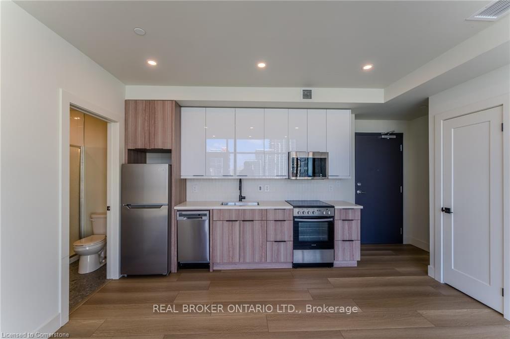 Photo 3 of Unit 702, 24 Augusta Street, Hamilton, Corktown — HOMEH