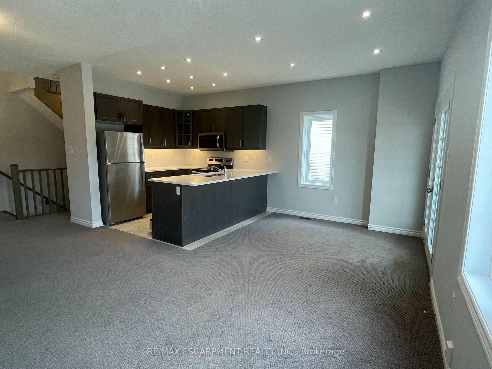 Photo 3 of Unit 94, 88 Decorso Drive, Guelph, Clairfields — HOMEH