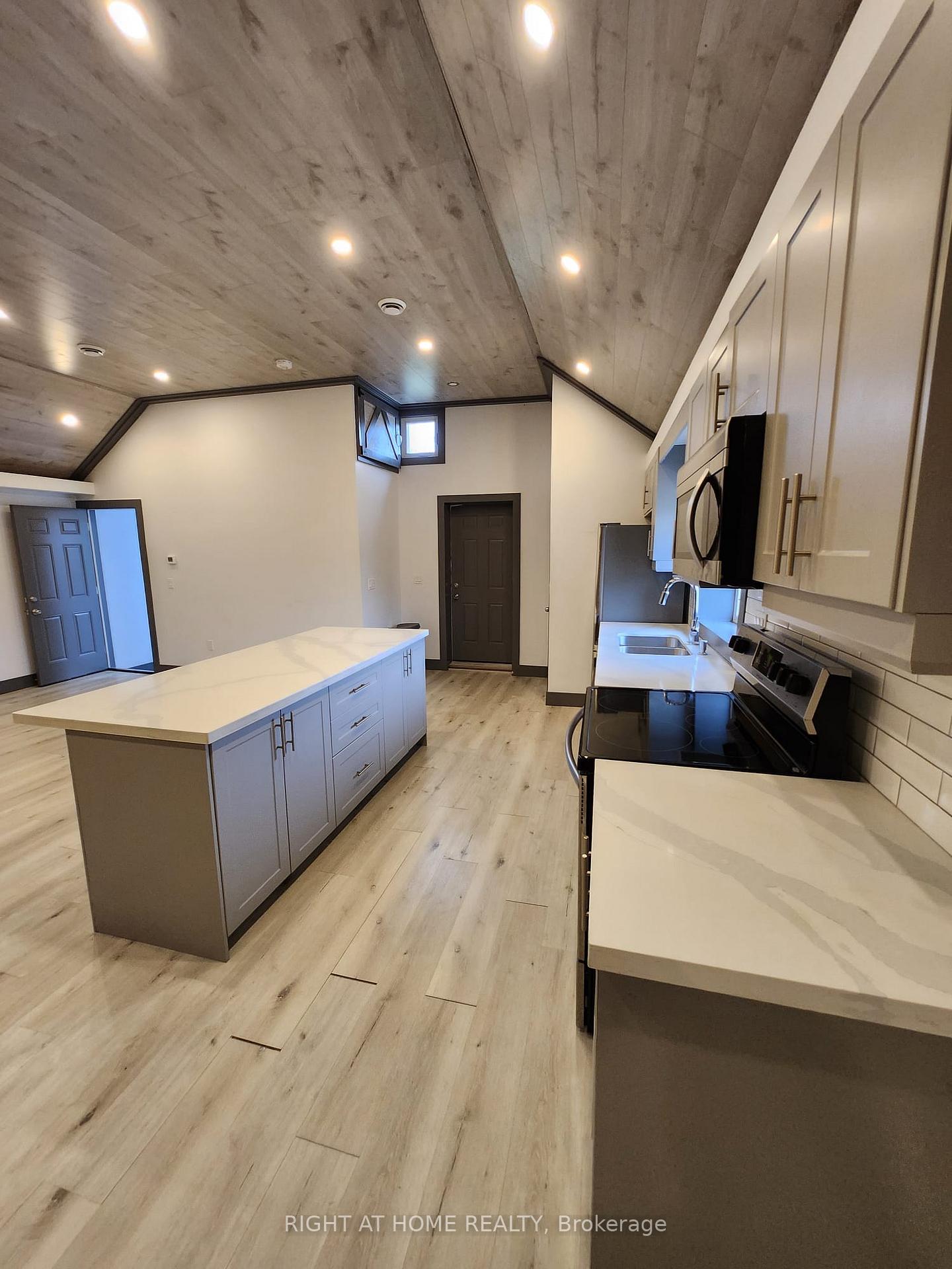 Photo 6 of Unit UPPER LEVEL, 3038 Rural Rd 56, Hamilton, Binbrook — HOMEH