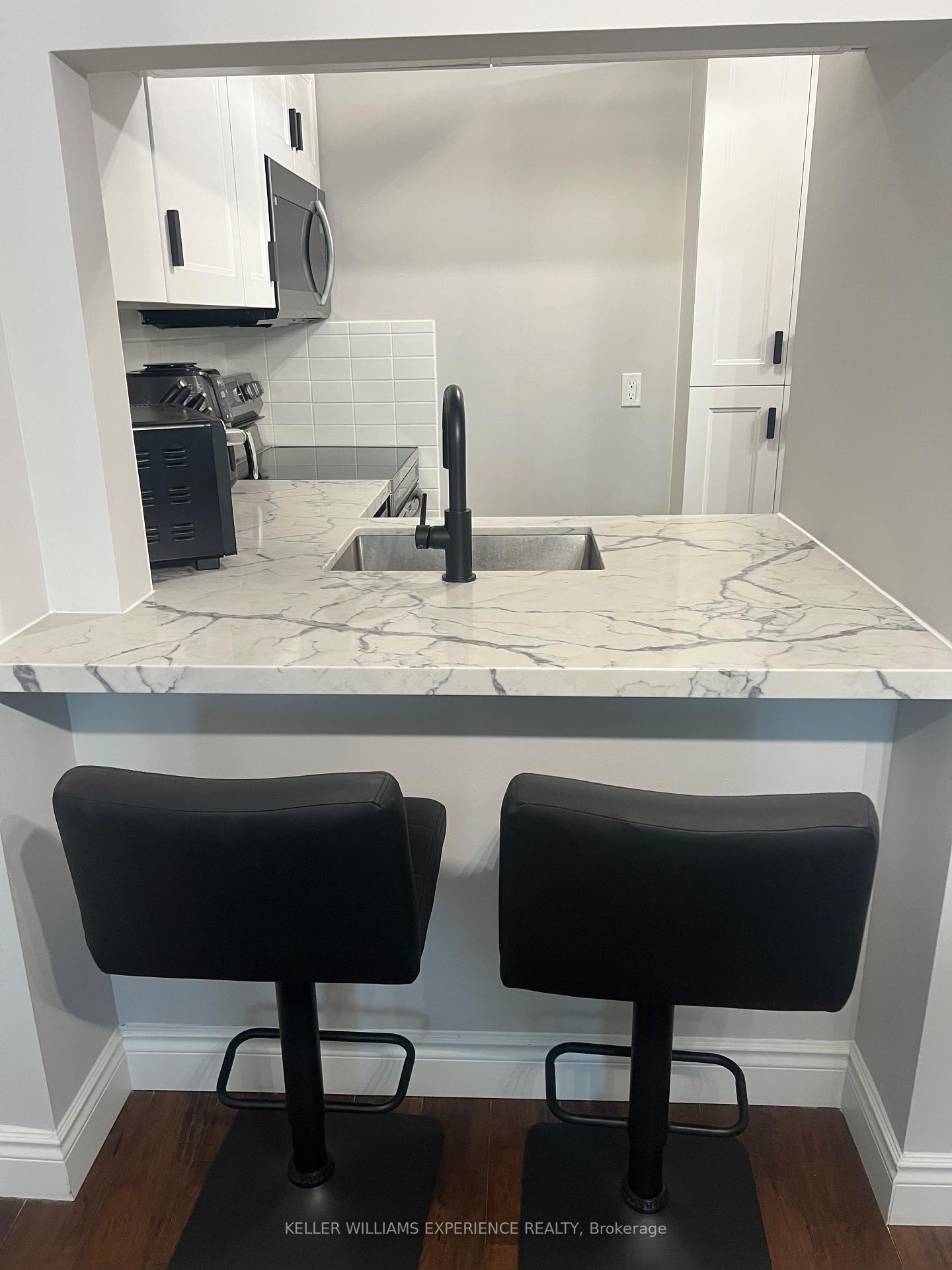 Photo 14 of Unit 401, 140 Dunlop Street E, Barrie, City Centre — HOMEH
