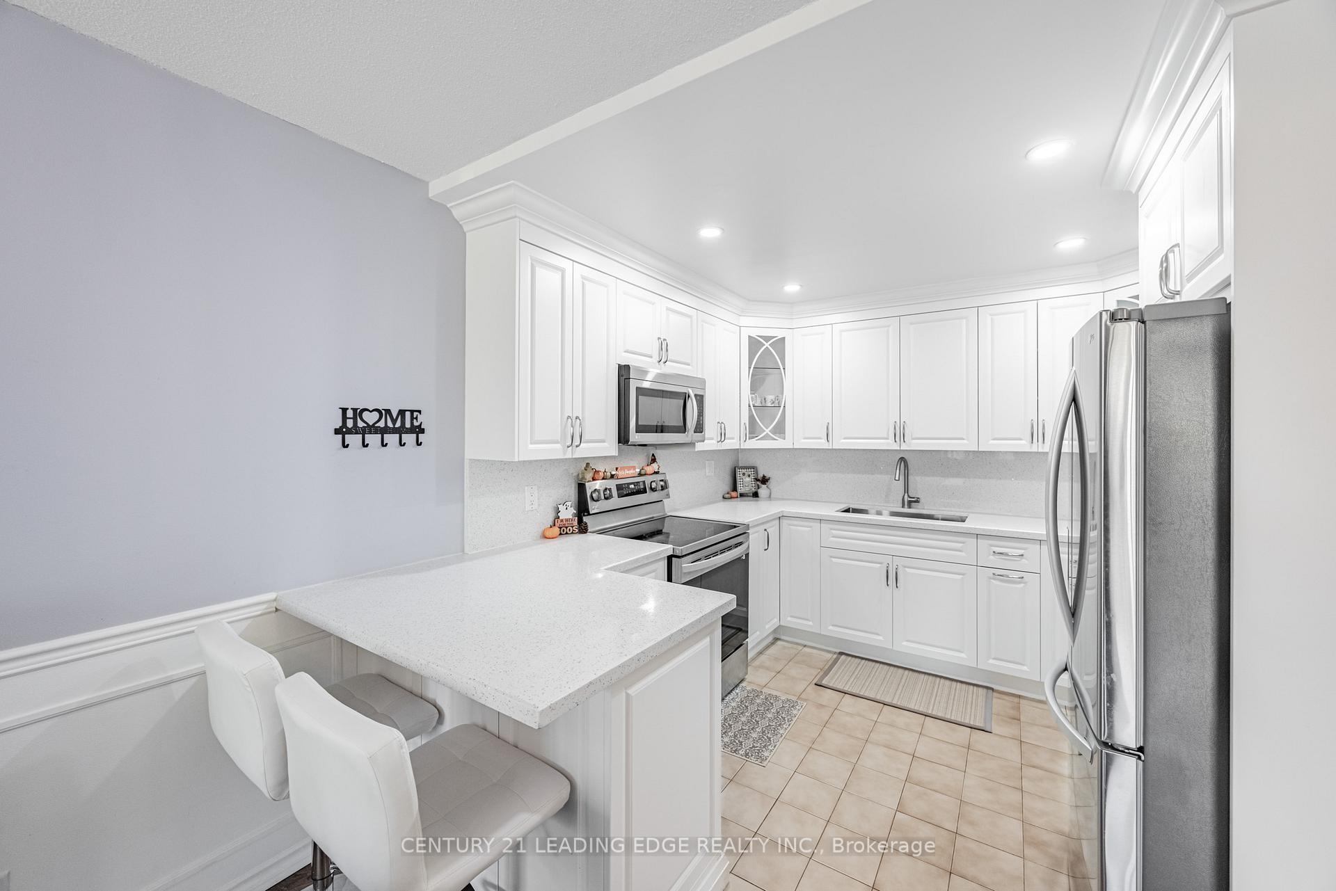 Photo 9 of Unit 401, 310 Mill Street S, Brampton, Brampton South — HOMEH