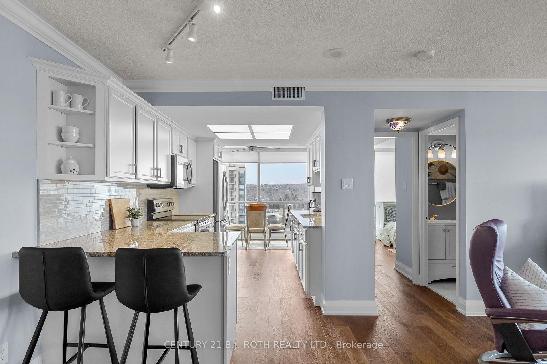 Photo 4 of Unit 808, 65 Ellen Street, Barrie, Lakeshore — HOMEH