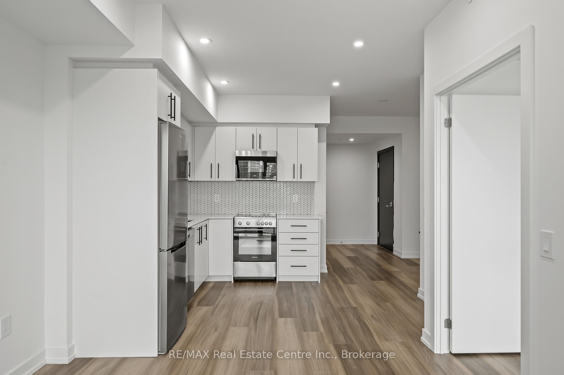 Photo 3 of Unit 414, 5 Wellington Street S, Kitchener — HOMEH