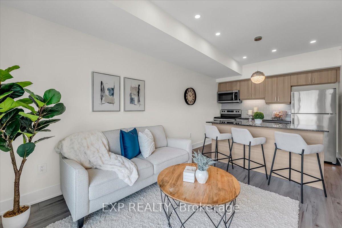 Photo 2 of Unit 410, 8 Culinary Lane, Barrie, Innis-Shore — HOMEH